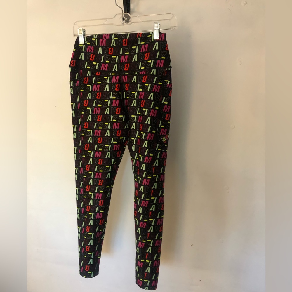 New with tags- Authentic Zumba In Motion Leggings.